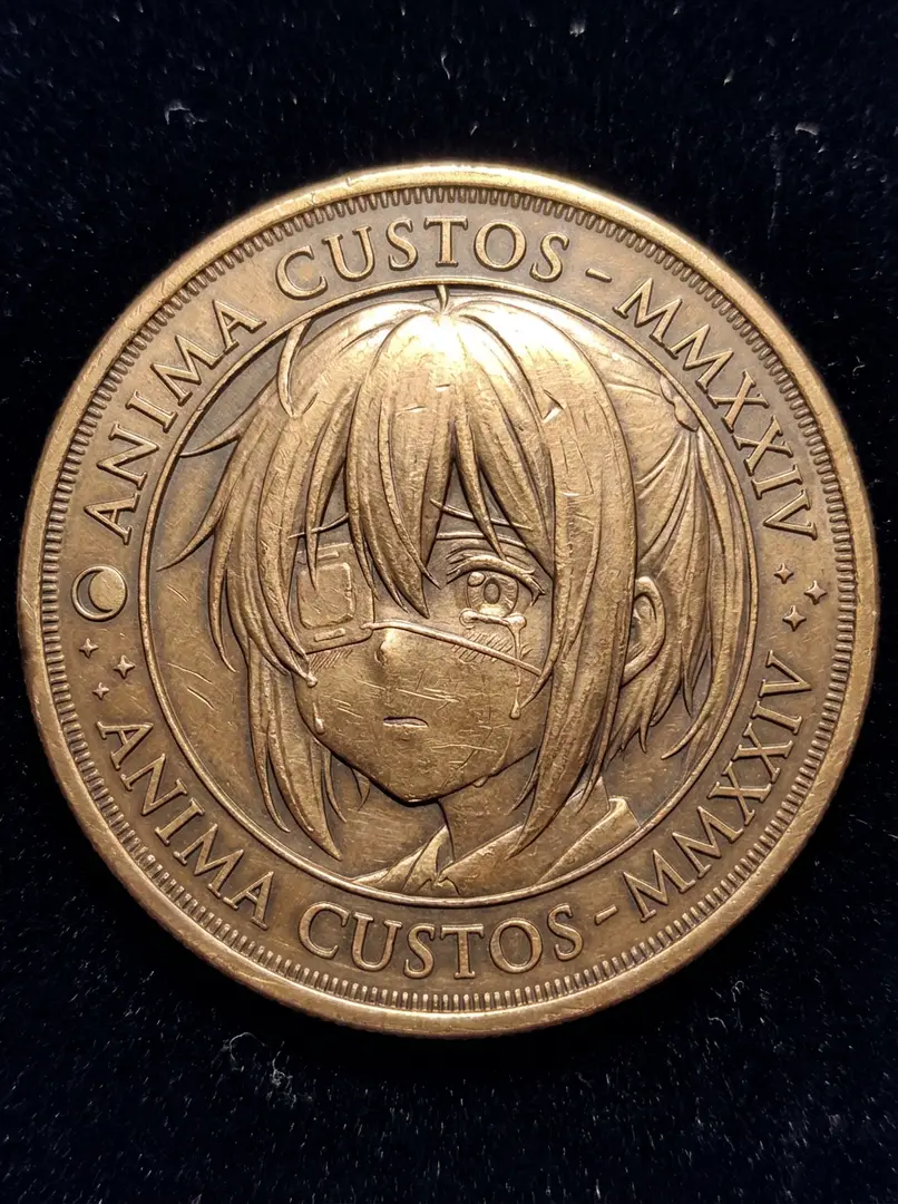 浮き彫り顔金属コイン